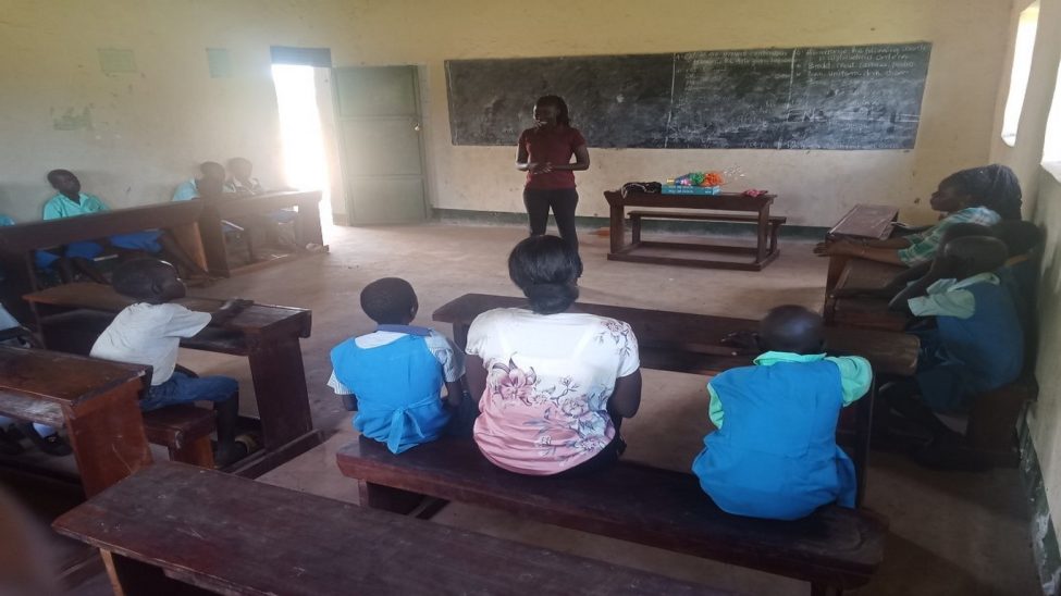 Community Mobilizers conducting Indoors PSS recreational Activities in Ibalany P/S