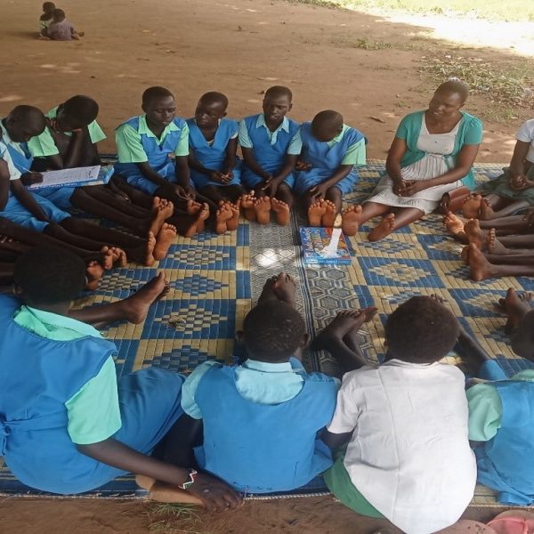 Community Mobilizers conducting Indoors PSS recreational Activities in Ibalany P/S