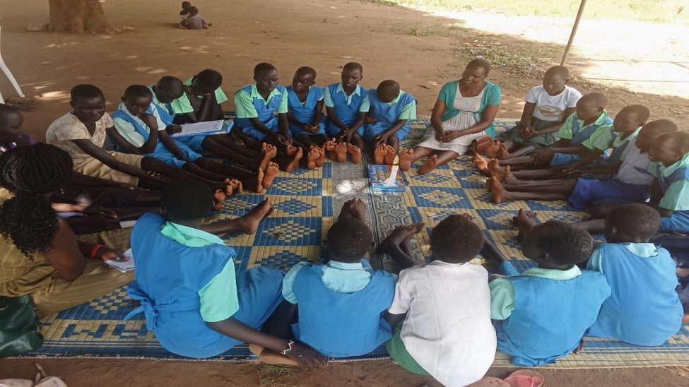 Community Mobilizers conducting Indoors PSS recreational Activities in Ibalany P/S